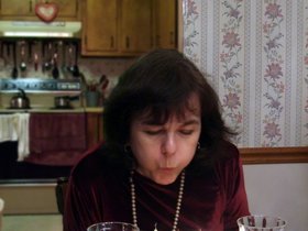 ../2009/12/25-2008-baltimore-MD-holiday-dot-candle-mom.jpg