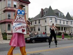 02-1324-davis_sq-honk_parade-parade-stilts-class-warfare.jpg